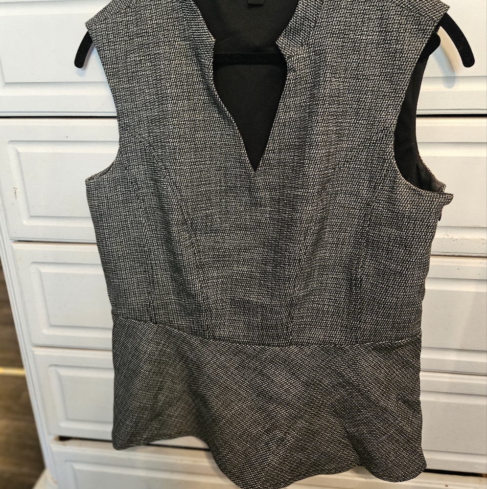 Le CHATEAU Gray Sleeveless Top With Peplum Waist.